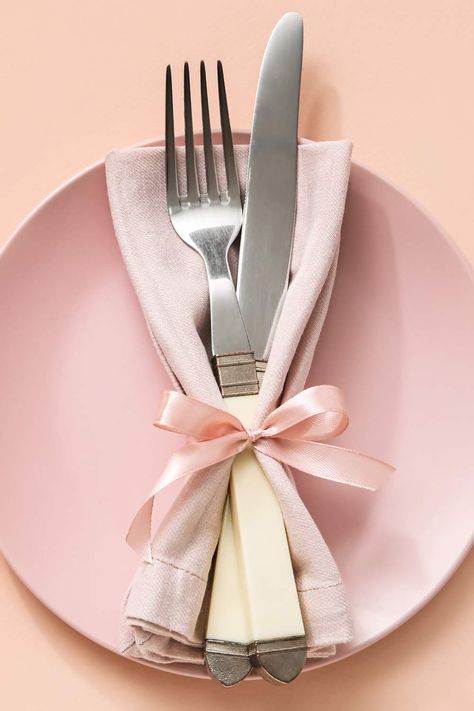 Cute Napkin Ideas, Dinner Party Napkin Ideas, Easy Dinner Table Decor Simple, Pink Napkin Table Setting, Pink Party Table Setting, Pink White And Gold Bridal Shower Ideas, Napkin Ribbon Tie, Napkin Folding Ideas With Ribbon, Coquette Table Set Up