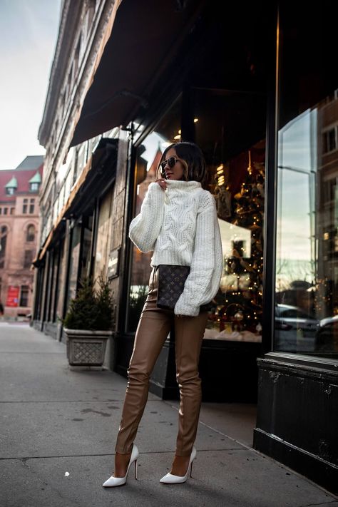 fashion blogger mia mia mine wearing a chunky white sweater from revolve with brown faux leather pants from zara. click through to see how to style leather pants, brown leather pants outfit, chic leather leggings outfit, neutral winter outfit, cozy winter looks, and casual everyday outfits. #winterfashion #womensfashion #outfitinspo #style Brown Leather Pants Outfit, Lederhosen Outfit, Mia Mia Mine, Brown Leather Pants, Leather Leggings Outfit, Look Legging, Mia Mia, Leather Pants Outfit, Eve Outfit