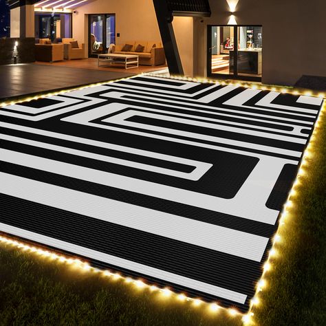 PRICES MAY VARY. Reversible Mats, 100% Made out of woven plastic. So it's waterproof, won't stain, and durable. Classic Black and White Striped Design, 9x12ft Large outdoor rug is perfect for every outdoor camping trip in the summer, just lay it flat on the ground. Outdoor plastic straw rug creates a relaxed and enjoyable outdoor living for you. Light up your night. Simply plug the LED cord into an outlet (adapter not included).The mat is functional and versatile both indoors and outdoors.The st Small Outdoor Sitting Area, Black White Patio, Black And White Patio Decor, Black And White Outdoor Patio, Small Backyard Oasis, Porch Vibes, Rv Deck, Black And White Patio, Large Outdoor Rugs