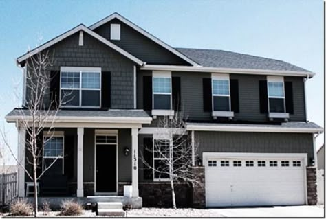 Exterior house ideas. Dark door, dark shutters, grey siding , white trims and gutters, grayish brick foundation cover. Grey House White Trim, Brown House Exterior, Black Siding, Dark Grey Houses, Grey Exterior House Colors, Black And White House, Grey Siding, Gray House Exterior, Black Shutters