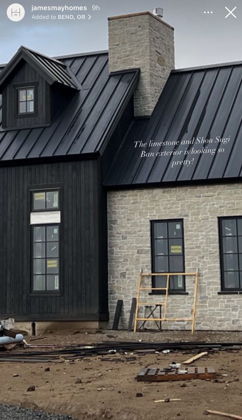 New Build Modern Farmhouse, Ledger Stone House Exterior, Covered Walkway Between House And Garage, Limestone House Black Trim, Stone And Dark Siding Exterior, Dark House With Stone, Black House With Stone Accents, Dark Siding With Stone Exterior, Black Exterior Farmhouse Ideas