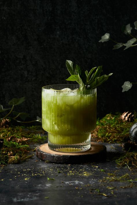 Step into the murky depths of the bayou with this haunted swap water cocktail. Made with homemade green juice, gin, Chartreuse and matcha and served with dry ice, this bubbling green cocktail is perfect for a spooky Halloween celebration. Swamp Water Drink, Homemade Green Juice, Haunted Swamp, Harry Potter Movie Night, Swamp Water, Mint Simple Syrup, Gin Cocktail Recipes, The Bayou, Green Cocktail