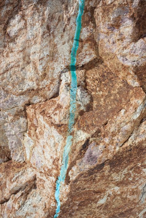 A turquoise vein in the Kingman Turquoise Mine. The turquoise will be mined from the host stone and handcrafted into our incredible turquoise tile collections. Turquoise Tile, Minerals Crystals Rocks, Raw Turquoise, Rock Creek, The Host, Many Faces, Kingman Turquoise, Natural Forms, Raw Stone