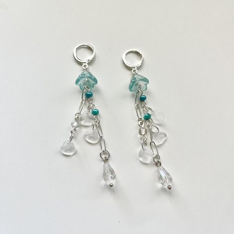 Glass Jellyfish 🪼 dangle earrings

Earrings contain... - Depop Glass Jellyfish, Trumpet Flower, Flower Beads, Seed Bead Earrings, Blue Turquoise, Jellyfish, Beaded Flowers, Chains Jewelry, Beaded Earrings