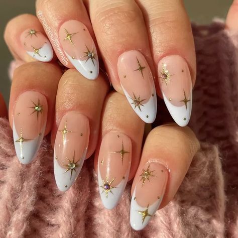 24 Pastel French Nail Ideas to Spring Your Mani Forward Round Nails Christmas Designs, Demure Christmas Nails, Fun Nye Nails, Round Holiday Nails, Almond Nails Designs Holiday, White Nails With Gold Stars, Christmas Star Nails Design, Star Christmas Nails, Celestial Nails Acrylic