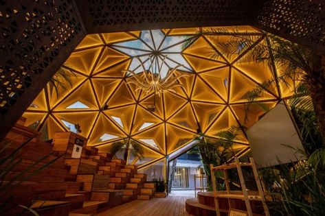 interior of yellow geometric dome with skylight Rounded Architecture, Geometric Dome, Parametric Architecture, Tree Canopy, Parametric Design, Geodesic Dome, Conceptual Design, Yanko Design, Architecture Portfolio