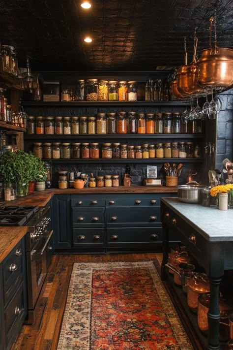 Alchemist's Corner in western gothic kitchen design transforms the space into one of wonder and experimentation, with shelves filled with jars of colorful spices and herbs. Antique scales, copper pots, and ancient symbols etched into the counters evoke a sense of time-honored practices merged with modern culinary techniques. This kitchen is for those who enjoy a touch of the old-world in their cooking. Turn your kitchen into an Alchemist's Corner—click here for ideas! Rustic Witchy Kitchen, Moody Decor Kitchen, Dark Apothecary Kitchen, Moody Country Kitchen, Cottage Witch Kitchen Aesthetic, Dark Cottagecore Decor Kitchen, Home Baker Kitchen, Vintage Kitchen Modern, Apothecary Kitchen Aesthetic