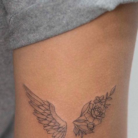 Half Angel Wings Half Flowers Tattoo, Angel Wing Tattoo On Ribs, Feminine Wing Tattoo, Half Angel Half Butterfly Tattoo, Tattoo Ideas Female Wings, Dainty Wing Tattoo, Angel Wing Flower Tattoo, Floral Angel Wings Tattoo, Angel Wings With Date Tattoo