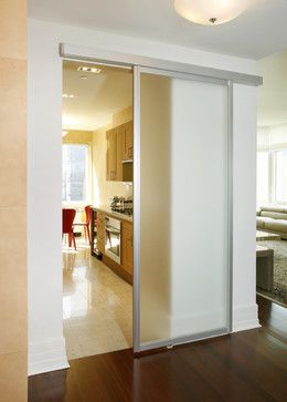 If you want to be able to close off the kitchen but still want an open feeling and light, install a door made of a translucent material.  - diSalvo Interiors Frosted Sliding Door, Frosted Door, Semi Open Kitchen, Kitchen Sliding Doors, Closed Kitchen, Contemporary Loft, Slider Door, Modern Sliding Doors, Kitchen New York