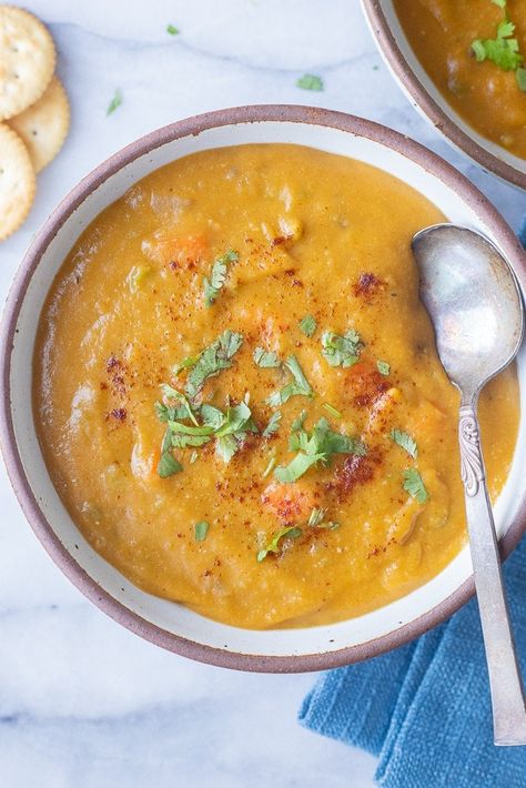 This Vegetarian Split Pea Soup is packed with tons of flavor and gets its smokiness from the smoked paprika. This plant based soup is hearty, filling and perfect for a cold winter day. Aside from split peas, it is also filled with carrots, celery, onion and potatoes. Enjoy for lunch or dinner and serve with bread and salad, if desired. #splitpeasoup #vegetarianrecipe #veganfood #easylunch #onepotmeal #heartysoup Dinner With Salad, Plant Based Soup, Vegetarian Split Pea Soup, Warming Soups, Vegan Split Pea Soup, Split Pea Soup Recipe, Plant Based Soups, Split Peas, Carrots Celery