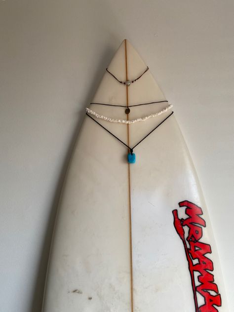 #surfergirl #necklace #surfboard #jewelry #necklaceorganization #surf #beachvibes #beach #summer Surfboard Jewelry, Surfboard Necklace, Beach House Room, Salted Granola, Surf Necklace, Necklace Hanger, Wooden Surfboard, Surf Jewelry, Cat Summer