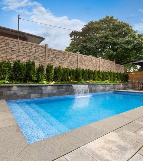 Retaining Wall Pool Ideas, Pool And Retaining Wall, Wall Pool Design, Pools Built Into Hillside Backyard, Pool With Water Feature Wall, Pool Wall Fountain, Raised Wall Pool, Swimming Pool With Retaining Wall, Sloped Yard With Pool