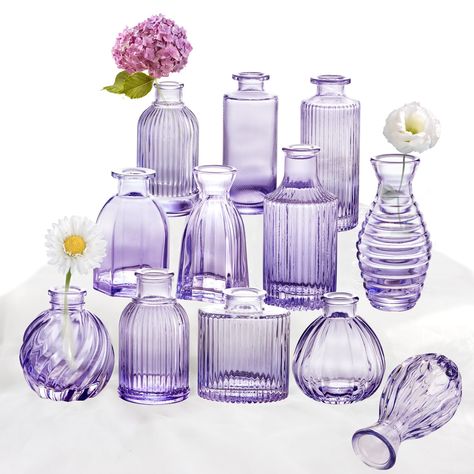 PRICES MAY VARY. 💜[Purple Glass Vases Set of 12] - The small purple vase in bulk come with 12 different designs of ribbed glass vases for flowers (please refer to the size chart). They are cute bud vases for decor. The romantic purple collections offer a variety for small arrangements, add an extra pretty cute touch to anywhere, especially for wedding centerpieces. 💜[Purple Vase for Wedding Centerpieces] - These vintage glass vases are perfect wedding decoration vases for single flower arrange Floating Candles With Purple Flowers, Tall Glass Vase With Wildflowers Ans Willow, Butterfly Centerpieces Vase, Gold And Purple Vase, Lavender Baby Shower Centerpieces With Tea Lights, Wild Flower Wedding Theme Centerpieces, Glass Vase With Lavender, Vases In Bulk, Colored Vases Centerpieces