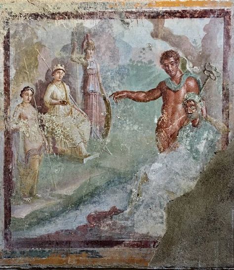 The fresco depicts the Judgement of Paris: The Trojan prince stands next to Mercury, pointing at the chosen goddess  depicted on the opposite wall with the other two goddesses.  House of Venus in a Bikini. Pompeii Roman Painting, Ancient Pompeii, Ancient Roman Art, Italy History, Pompeii And Herculaneum, City Museum, Roman Mythology, Roman Art, Philadelphia Museum Of Art