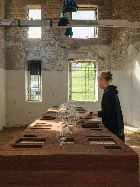 kuidas.works builds rammed earth dining table within seven days Wine Exhibition, Industrial Cafe, Dog Rose, Pop Up Restaurant, Timber Windows, Rammed Earth, Square Plates, Mattress Springs, Counter Top