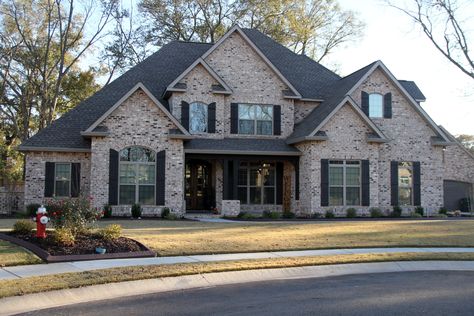 Graystone is a perfect brick light colored brick with hints of red, white and black showing through. A customer favorite in our Classic Collection. All of our brick is sure to enhance any building project. In addition to being versatile our Classic Collection provide memorable results, utilizing their unique range of textures and characteristics to make your structure truly one of a kind because our brick comes in a wide array of colors including reds, browns, earth-tones, and pinks. Houses In Georgia, House Pic, Houses Exterior, Stone Exterior Houses, Light Brick, Suburban House, Georgia Homes, Brick Exterior, Brick Exterior House