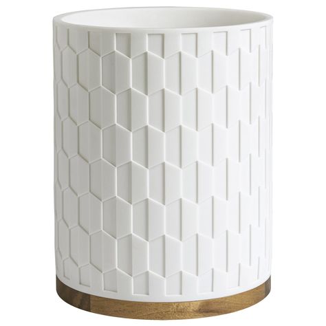 PRICES MAY VARY. Crisp and clean embossed geometric designed wastebasket in white with a warm wood grain base, brings sophisticated style and textural appeal to your bathroom Made of resin with wood accents Finished size: 7.48" x 7.48" x 9.65", Capacity: 1.64 gallons Decorative and functional, works well in your bathroom as well as other rooms in your home Spot or Wipe Clean Coordinate with Sarasota Bath Collection or use separately Add a crisp, clean touch to your bathroom with the Sarasota Was Bathroom Trash Cans, Bathroom Waste Basket, Kitchen Countertop Decor, Kids Bathroom Accessories, Tidy Bathroom, Kids Shower Curtain, Countertop Decor, Bath Store, Bathroom Trash Can