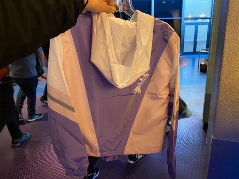 PHOTOS: New Space Mountain Windbreaker Takes Off at Disneyland - WDW News Today Purple Color Schemes, Women's Windbreaker, Disney Clothes, Space Mountain, Womens Windbreaker, New Space, Disneyland Resort, Disney Outfits, S Star