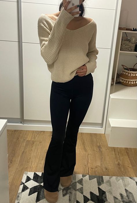 Cream off the shoulder sweater with flared leggings and Ugg boots Leggings And Knitted Sweater, Thanksgiving Outfit Leggings, Brown Flare Leggings Outfit, Flare Leggings Outfit Winter, Brown Leggings Outfit, Ultra Mini Uggs Outfit, Mini Uggs Outfit, Flare Leggings Outfit, Leggings Outfit Winter