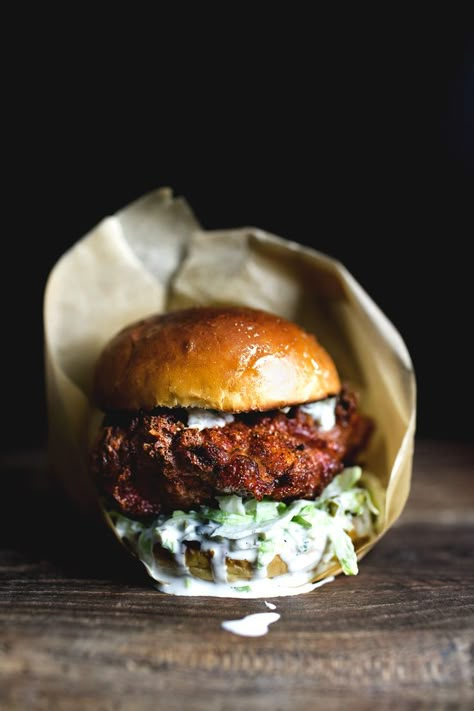 Spicy fried chicken sandwich made with brined chicken coated in a sriracha batter and dressed in jalapeno yogurt mayo. Spicy Fried Chicken Sandwich, Spicy Fried Chicken, Fried Chicken Sandwich, Smitten Kitchen, Munnar, Burgers Sandwiches, Chicken Sandwich, Sandwiches Wraps, Sandwich Recipes