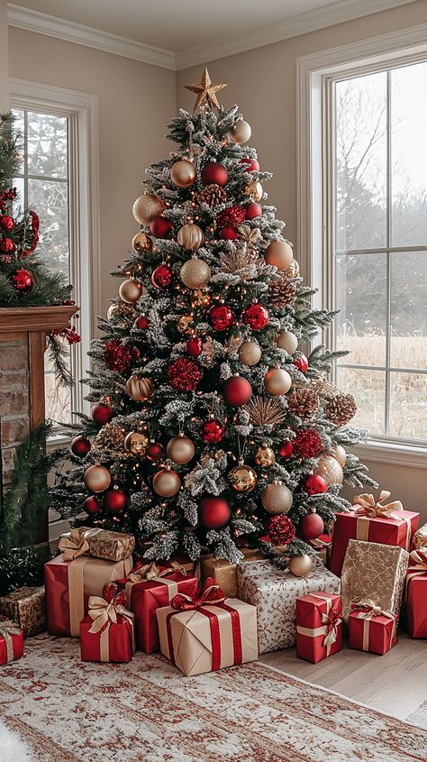 Embrace the magic of Christmas with this beautifully decorated tree! 🎄✨ Featuring rich red and gold ornaments, glittering stars, and a cozy, snow-dusted scene. Perfect for creating that warm holiday ambiance. Let the festive spirit fill your home! 🎁🎅 #Christmas #decor #holiday #tree #red #gold #cozy #gifts #festive #home #decorations #magic Red And Gold Ornaments, Štědrý Den, Christmas Tree Inspo, Christmas Dreaming, Christmas Tree Decorating Themes, Elegant Christmas Trees, Creative Christmas Trees, Christmas Decor Inspiration, Red Christmas Tree