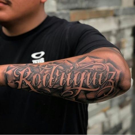 Tattoo Lettering Design Chicano Font, Forearm Name Tattoos, Last Name Tattoos, Arm Tattoos Lettering, Old English Tattoo, Tattoo Name Fonts, Meaningful Word Tattoos, Tattoo Font For Men, Last Name Wood Sign