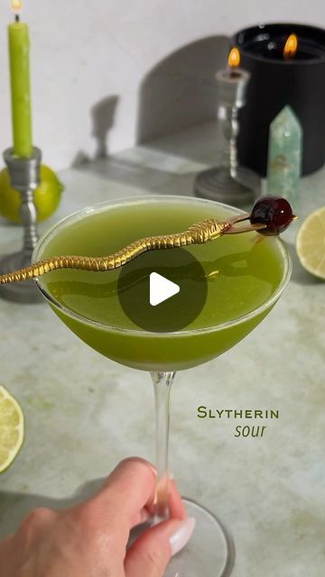 Kelly Pettit | Slytherin Sour 🐍🪄 (aka a tastier midori sour)

1 oz midori
1 oz vodka
.75 oz matcha
1 oz lemon lime juice
.25 oz vanilla syrup
Garnish:... | Instagram Slytherin Cocktail, Snake Cocktail, Harry Potter Cocktails, Midori Sour, Make Matcha, Halloween Cocktails, Vanilla Syrup, Cocktail Picks, 7 Seconds