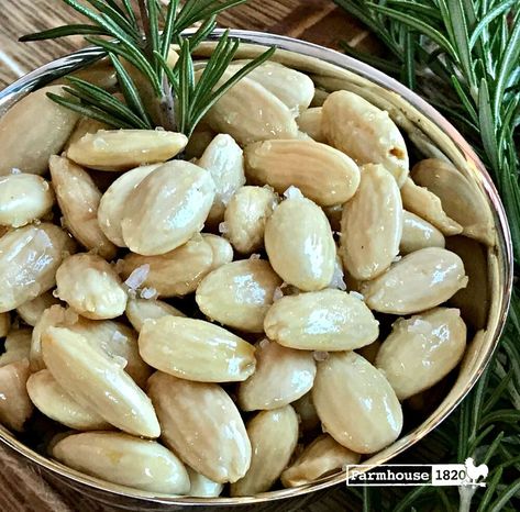 This recipe is so easy, one might think they missed something. Truth is, it is just that easy, and the perfect pairing at a cocktail party, or even just a snack. Something about the combination of flavors with the rosemary and the almonds is incredible. Blanched almonds are found in the gourmet section of the grocery store. All you need to do from there is steep rosemary in olive oil for a few minutes; pour over the almonds and stir to combine; sprinkle with salt and then roast in a pr… Salted Almonds Recipe, Rosemary Almonds, Charcuterie Dips, Roasted Olives, Almonds Recipe, Appetizers Cheese, Healthy Homemade Snacks, Quick Healthy Snacks, Appetizer Platters