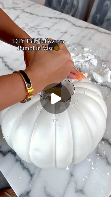 Tamara Bradshaw on Instagram: "DIY FALL/HALLOWEEN PUMPKIN VASE. What do you rate this btwn a 1 & a 10??!🎃

Guys if you love this DIY please comment, like, and share! Love you boos😘

Foam Pumpkin, extra fine gold glitter, spray paint: Hobby Lobby✨

Vase: Dollar Tree✨

Fresh Flowers: Local Grocery Store✨

Carve out pumpkin. Take all the foam out. Spray paint pumpkin color of your choice. Let dry outside for a couple hours. Fill bucket with water. Spray the spray paint into the water. I used gold and white spray paint. Add extra fine gold glitter to water. Stir. Dip pumpkin in and out of water creating the design you like. Let dry for 24 hours. Insert vase into pumpkin. Style. The End😬

#diyhomedecor #diydecor #diyideas #diyhome #falldecor" Foam Pumpkin Decorating Ideas, Fill Bucket, Gold Glitter Spray Paint, Bucket With Water, Paint Pumpkin, Pumpkin Patch Corn Maze, Glitter Spray Paint, Pumpkin Stencils, Pumpkin Vase