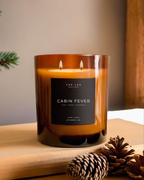 Escape the hustle and bustle with Cabin Fever. This cozy blend of pine, cedar, and patchouli will transport you to a serene mountain cabin. Perfect for a relaxing evening in. 🌲🍂 #candles #candlelover #candlesofinstagram #relax #home #homedecor #fall #fragrance #falldecor Forest Retreat, Patchouli Scent, Amber Jar Candle, Earthy Fragrance, Coconut Wax Candles, Clear Jars, Pumpkin Latte, Amber Jars, Time 100