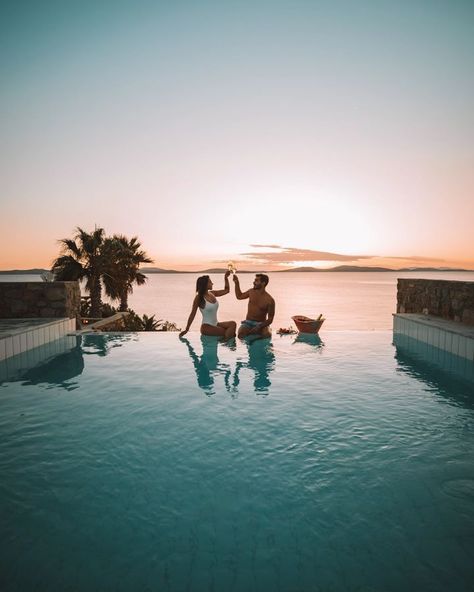 mykonos pool vila sunset toast couple goals #hotelsansresorts #hotels #mykonosgrandresort #mykonos #greece #travel #couplephoto Resort Couple Photography, Mykonos Pool, Swimsuit Photoshoot, Hotel Photoshoot, Resort Photography, Safari Photo, Swimsuits Photoshoot, Luxury Couple, Vacation Photo