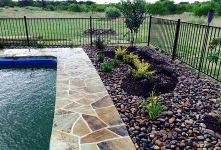 River Rock around pool Desert Pool, Landscape Beds, Landscaping Around Pool, Deck Landscaping, River Rock Garden, Tattoo Plant, River Rock Landscaping, Pool Landscape, Pool Landscape Design