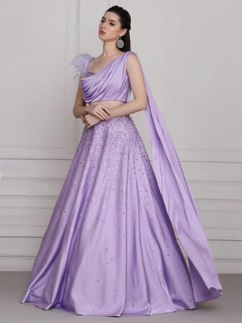 Drape Blouse Indian, One Side Sleeves Blouse Designs, Drape Gowns Designer Latest, One Side Sleeve Blouse, Lavender Gown Indian, Feather Blouse Designs, Drape Gowns Designer, Lavender Blouse Design, Pooja Peshoria