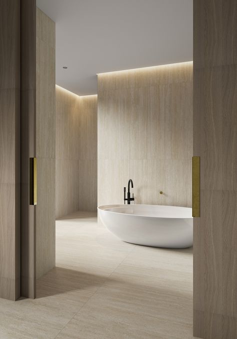 Our TRAVSTONE VEIN Series is inspired by the natural travertine stone, and features three beautiful colours with gentle organic veining. It is available in versatile sizes and is suitable for both commercial and residential use.⁠ Travertine Bathroom, Monochrome Interior, Interior Minimalista, Decor Baie, Contemporary Living Spaces, Bath Tub, Cadiz, Villa Design, Beautiful Bathrooms