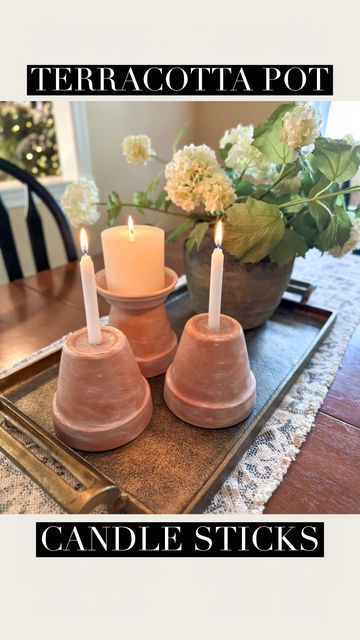 Tara Panasiuk on Instagram: "Terracotta pot candle sticks 🤗 So easy and affordable to make! Love giving my planter pots a weathered look like this.. I thought why not make candle holders out of them this time! 😍 What do you think?" Terracotta Pots Wedding, Clay Pot Candle, Terracotta Crafts, Flower Pot Candle Holder, Teracotta Pots, Make Candle Holders, Church Christmas Party, Christmas Shop Window, Make Candle