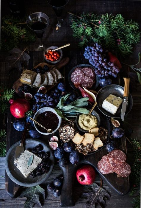 Celebrate the darkest day of winter with this dark, moody charcuterie board that is sure to brighten your day with delicious flavors. Winter Solstice Party, Victorian Party, Solstice Party, Entertaining Tips, Space Food, Solstice Celebration, Tracy Porter, Halloween Party Dinner, Winter Fruit