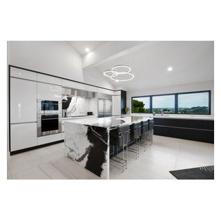 This black and white Antolini Panda marble island with waterfall sides makes a bold statement and is the focal point of the newly remodeled kitchen. We removed Panda Quartz Countertop, Panda Marble Kitchen, Panda Marble Bathroom, Panda Marble Texture, Black Marble Waterfall Island Kitchen, Panda Marble, Quartz Island, Newly Remodeled Kitchens, Marble Island