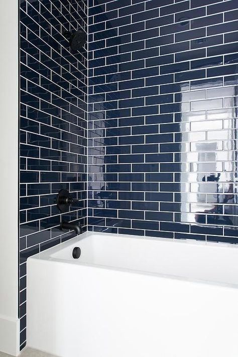 navy-blue-tiles-with-white-drop-in-bathtub #kitchenbacksplash Navy Bathroom, Bathtub Tile, Blue Backsplash, Interior Minimalista, Boys Bathroom, Trendy Bathroom, Blue Bathroom, Blue Tiles, Bath Room