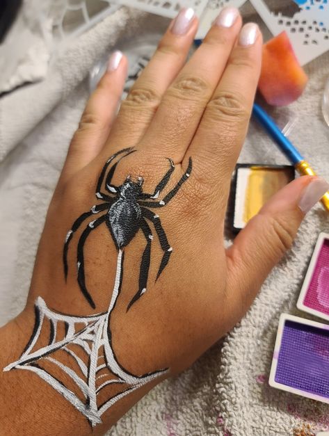 spider and web face paint on hand Face Paint On Hand, Web Face Paint, Boy Face Paint, Spider Face Paint, Spider Face Painting, Web Face, Spider Face, Face Painting For Boys, Painting Halloween