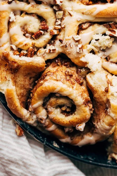 These homemade maple pecan cinnamon rolls are swirled with chopped pecans, maple cinnamon filling, and topped with a sweet maple icing. They're the perfect homemade cinnamon rolls to have this fall and are made completely by hand! | butternutbakeryblog.com Pecan Swirls Recipe, Pecan Cinnamon, Maple Icing, Pecan Filling, Pecan Cinnamon Rolls, Cinnamon Rolls From Scratch, Cinnamon Roll Icing, Cinnamon Filling, Fluffy Cinnamon Rolls