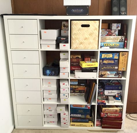 Board game shelves and Magic the Gathering card storage in our apartment!  IKEA - Kallax 4 x 4 IKEA - Kallax drawers Board Game Storage Cabinet, Board Game Shelves, Diy Trading Cards, Board Game Storage Ideas, Game Storage Ideas, Game Shelves, Apartment Ikea, Video Game Shelf, Sports Cards Storage