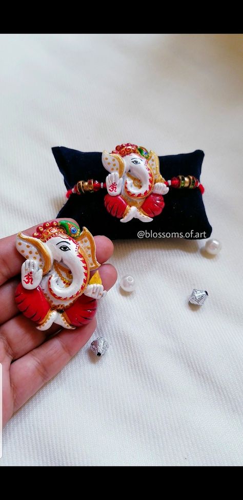 Rakhi designs/handmade rakh/ganesha rakhi/raksha-bandhan/ DIY rakhi Rakhi With Molded Clay, Rakhi Making With Clay, Clay Rakhi Design, Clay Rakhi, Rakhi Designs Handmade, Quilling Rakhi, Handmade Ganesha, Mouldit Clay, Handmade Rakhi Designs