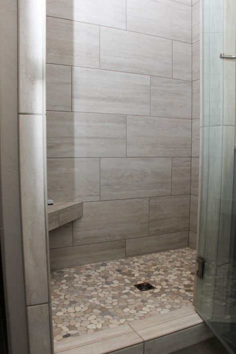 Gray Tiled Shower with Accent Pebble Tile Shower Floor Pebble Tile Shower Floor, Pebble Tile Shower, Gray Shower Tile, Shower Remodel Diy, Small Shower Remodel, Bilik Air, Pebble Tile, Tiled Shower, Bad Inspiration