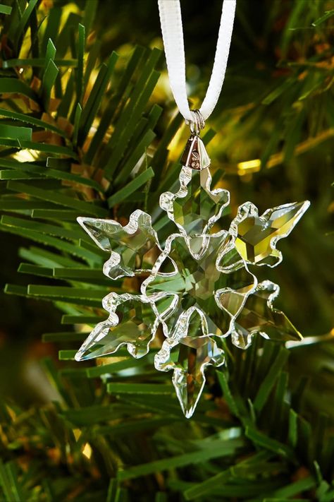 A Swarovski crystal ornament epitomises luxury and elegance, turning any holiday setting into a dazzling showcase of refined festive glamour. This post contains an affiliate link which adds no cost to you. Swarovski Christmas Ornaments, Swarovski Snowflake, Swarovski Christmas Tree, Swarovski Ornaments, Swarovski Christmas, Crystal Christmas Tree, Crystal Christmas, Crystal Ornament, Snowflake Christmas