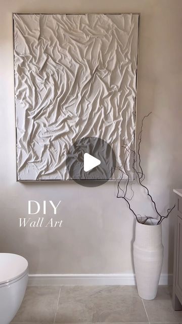 Ashley Gray on Instagram: "DIY wall art ✨🤍   I wanted something oversized and had the perfect capped frame wall art that I no longer needed so this made the perfect base for my diy!   I used an old bed sheet and some PVA glue mixed with water to create the texture and design 🤩   I then used some leftover paint to add colour and I’m so pleased with how it has turned out!   It is the perfect addition to my downstairs bathroom and I can’t wait to share the rest of this mini renovation soon 🤍✨  Hope you all have a lovely Sunday, I have the roast cooking away and looking forward to a chilled evening   A x   #diywallart #wallart #doityourself #dıyproject #craftproject #diyhack #diydecor #diyideas #neutraldecor #limewashpaint #limewash #homehacks #neutralhomedecor #texturedart #texturesandtone Diy Dream Home, Old Bed Sheets, Ashley Gray, Dollar Store Diy Organization, Pva Glue, Bathtub Decor, Rustic Bathroom Designs, Diy Abstract Canvas Art, Leftover Paint