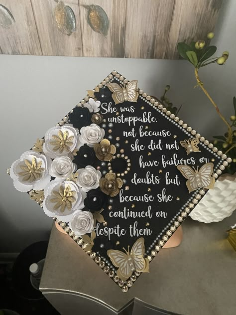 Hi everyone! this graduation cap topper is the perfect addition to your special day! It is made with heavy glitter card stock and permanent vinyl for the text. The paper flowers are all handmade by me and are what make my graduation cap toppers unique and elegant. This cap is made of high quality, durable materials that will keep you sparkling throughout your special day! How to attach to your graduation cap: There are double sided adhesive strips on the back, just peel off the backing and stick 2d Graduation Cap Designs, Bling Graduation Cap Ideas, High School Cap Decoration Senior Year, Nigerian Graduation Caps, Decorated Graduation Caps High School, Black Graduation Cap Designs, Graduation Cap I Did It For Them, Meaningful Graduation Caps, Black Graduation Cap Ideas