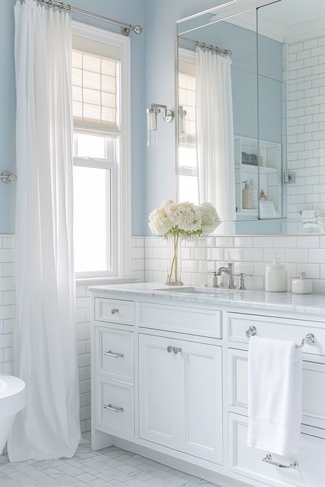 Transform Your Bathroom with These Chic Neutral Color Ideas - Home Tips Clubs Light Blue Small Bathroom, Grey And Cream Bathroom, Tan And White Bathroom, Baby Blue Bathroom, Light Blue Bathroom Decor, Pale Blue Bathroom, Blue Small Bathrooms, Peaceful Bathroom, Natural Cabinets