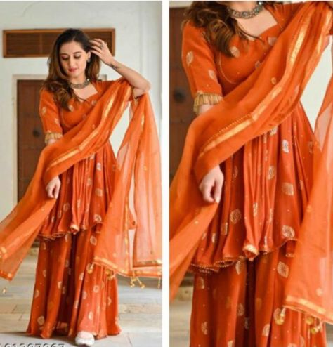 Orange Colour Dress Indian, Orange Colour Traditional Dress, Burnt Orange Anarkali, Orange Colour Dress Design, Orange Anarkali Suits Designer, Rust Indian Outfit, Orange Dress For Haldi, Burnt Orange Indian Outfit, Orange Western Outfit