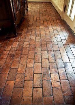 scrap wood end pieces. Then they are placed on the floor and painted to look like brick. Log Cabin Tile Floor, Wood Block Flooring Diy, Diy Cheap Wood Floors, Repurpose Hardwood Flooring, Budget Friendly Flooring Ideas, Wood Block Floor, Log Cabin Floors, Pallet Wood Floor, Cottagecore Flooring