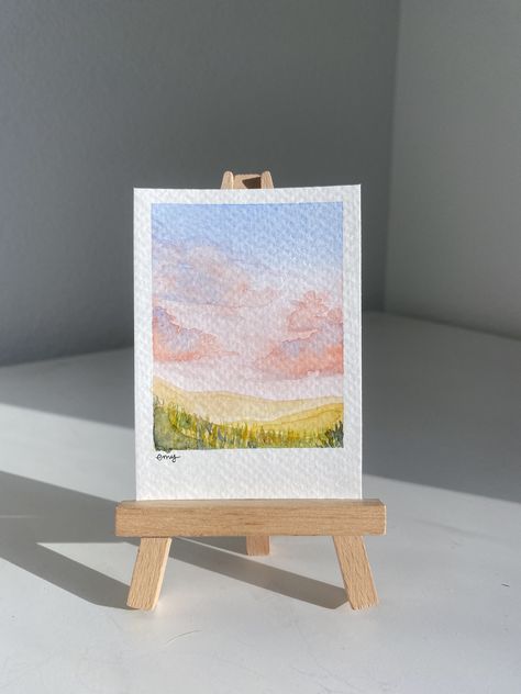 Tiny sunset polaroids. Each one is handpainted to order! These pieces are inspired by the Missouri landscape, making them a great keepsake, gift, or decoration for your own home! -Free shipping Please let me know if I can customize or perfect this design just for you! -Em Cute Mini Watercolor Paintings, Mini Art Prints, Mini Paintings Ideas Watercolors, Postcard Watercolor Ideas, Mini Watercolor Painting, Mini Watercolour Painting, Watercolor Art Landscape Simple, Simple Water Coloring Ideas, Watercolor Art Simple